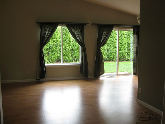 Custom shelves above the windows in the living room.