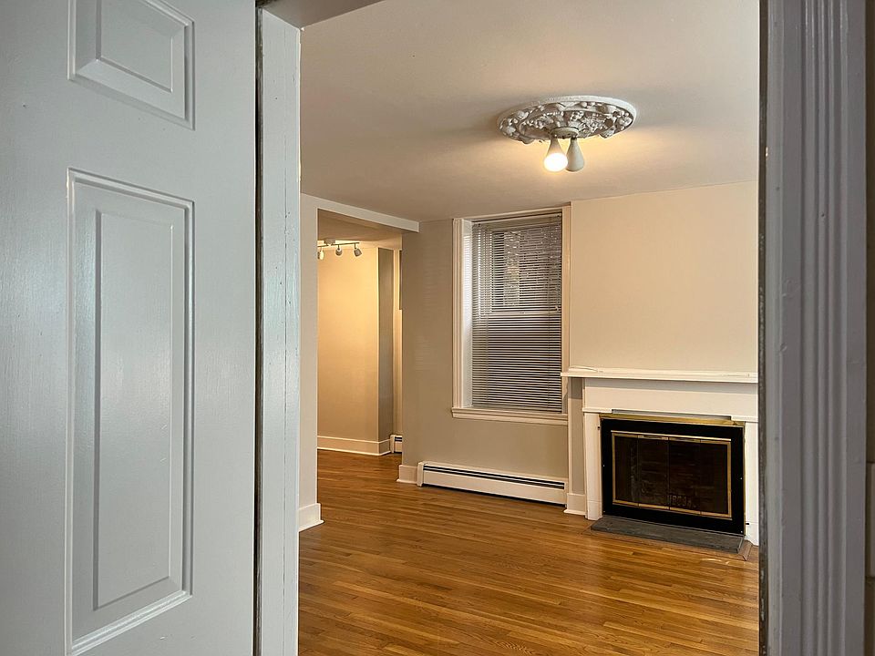 Enter into living room off of interior hallway