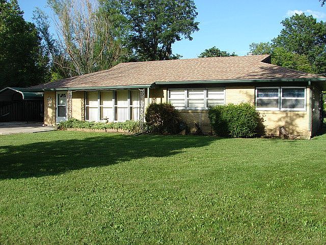 210 S. Denman