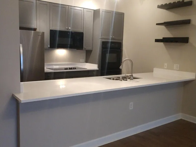 Large counter with space for 3-4 stools (space for dining table adjacent)