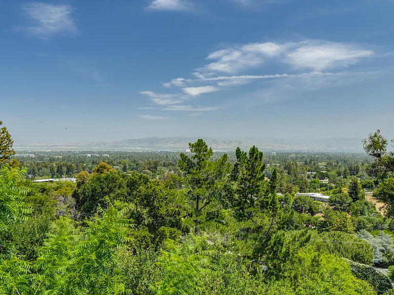 Wonderful rear upper deck beckoning for entertainment or relaxation, offering a spectacular view of the bay.