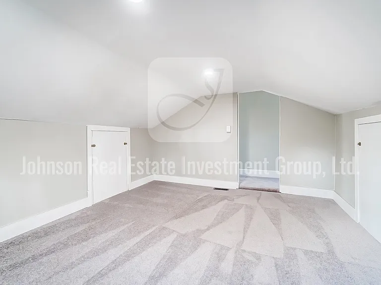 Versatile bonus room with lower ceiling _ great for a playroom or office.