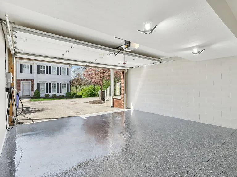 Two Car Garage - Finished Garage, Epoxy Flooring, Electric Charging Unit, Additional Lighting