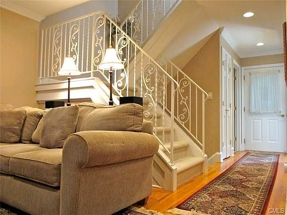 Custom wrought-iron railings & oak hardwood floors