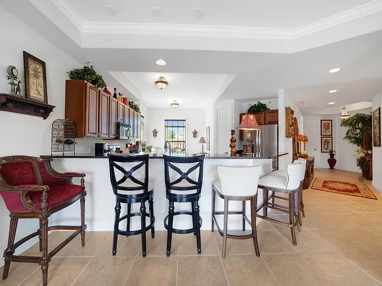 Kitchen bar, entry foyer to right