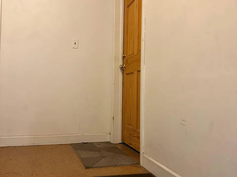 The door to Apt #1