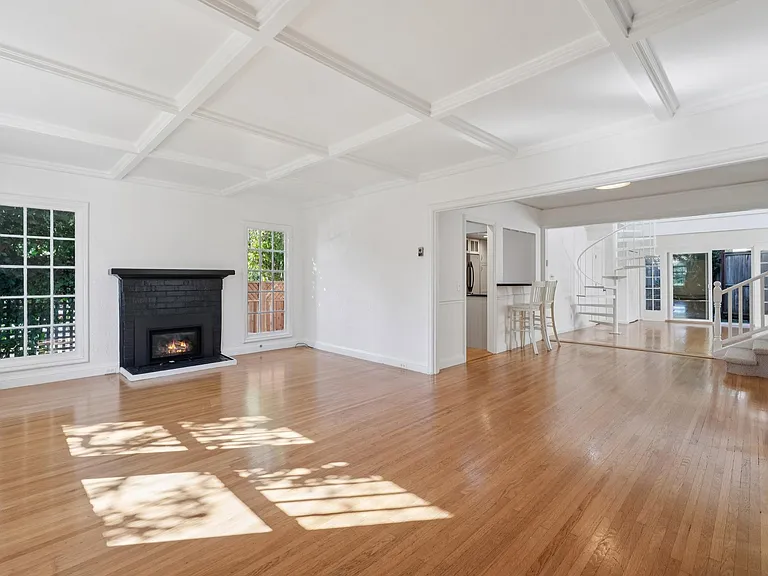 Different POV Living Room w/ fireplace and hardwood floors