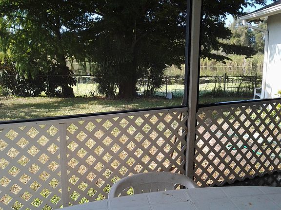 screened porch fenced yard