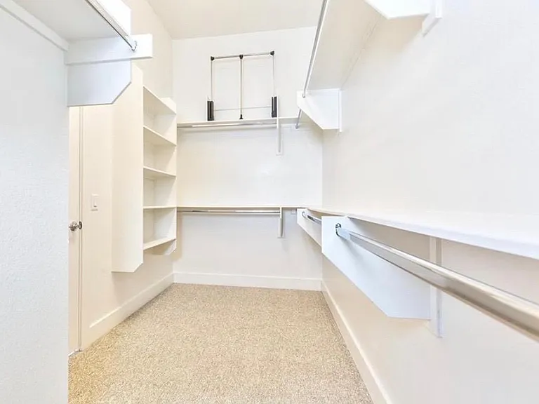 Primary closet is very spacious