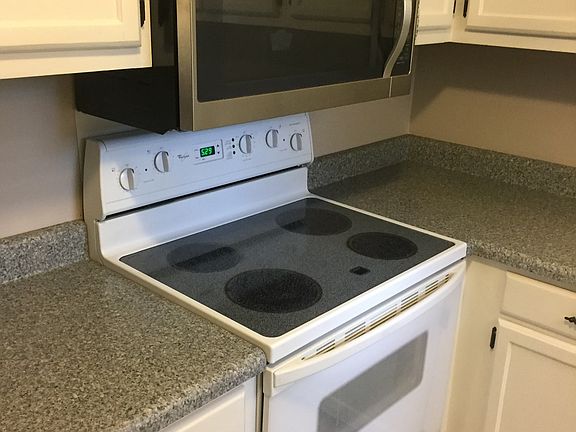 New microwave oven over glass top range