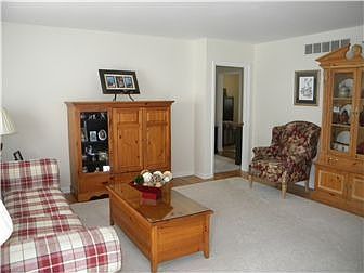 This Living Room features harwood floors and....