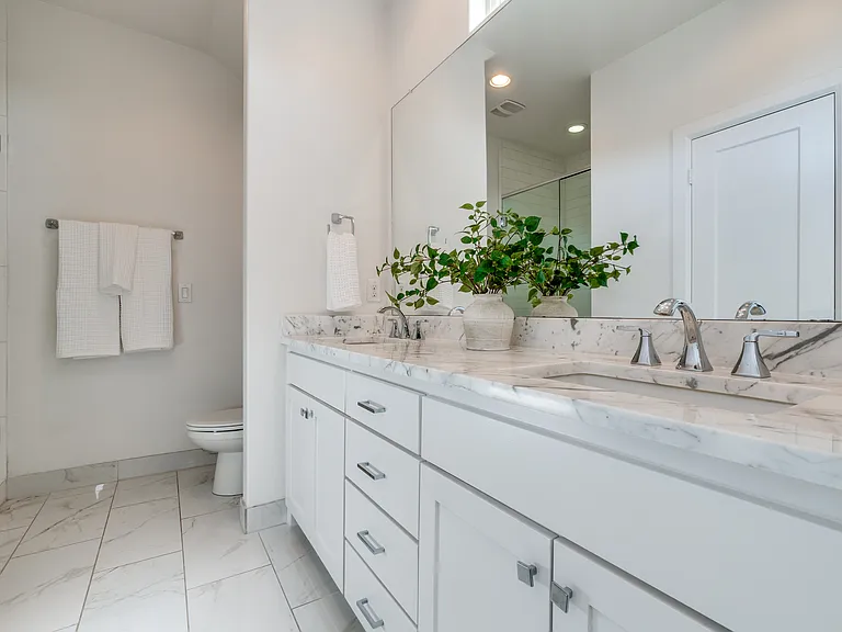 **Photos of Unit 1 to show lived in potential. Unit 5 is the same floorpan, finish outs and size.**