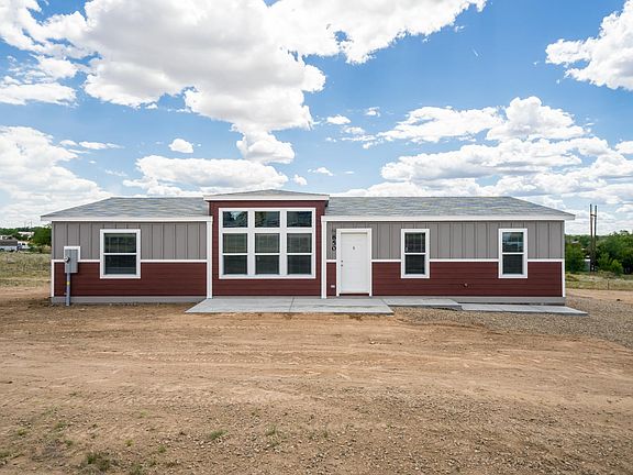 Nice front patio. 2x6 construction, upgraded insulation, Low-E vinyl windows.  Ground set with concrete block foundation.