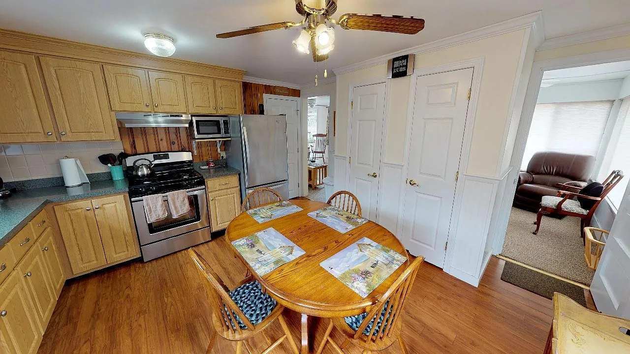 Relaxed Cape Living with 3 Bedrooms, Deck & Yard & Convenient Parking — Photo 4