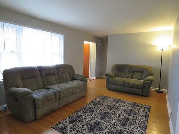 Entry foyer leading into living room.