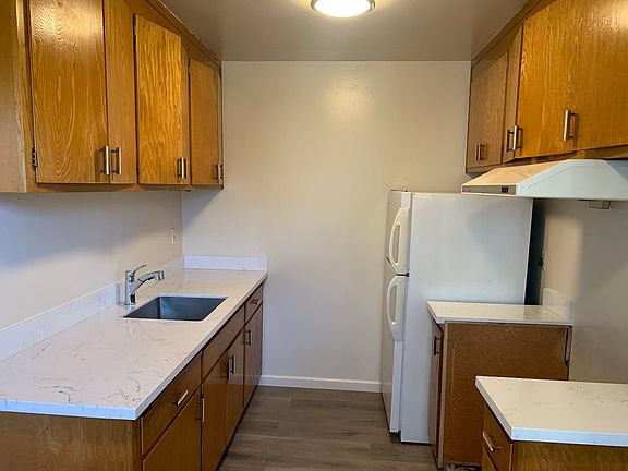 Kitchen with new floors/counters.