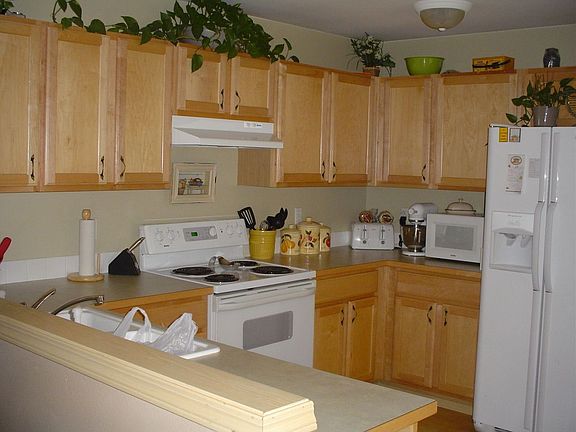 Huge kitchen with eating area and slider to back yard