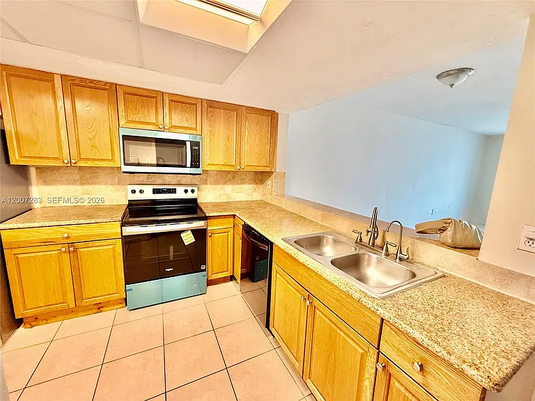 1591 NE Miami Gardens Dr #205 — Photo 14
