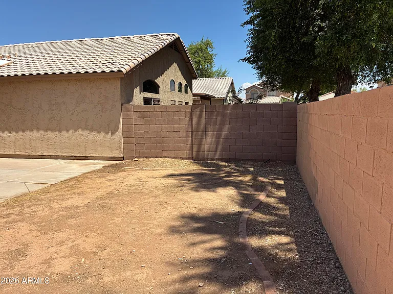 1909 N 106th Ln — Photo 40