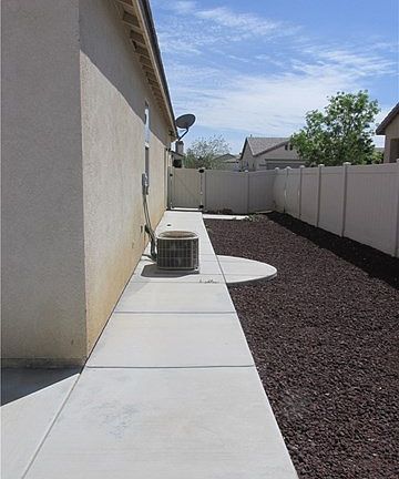 Nice Walkway from front of house, to back yard.