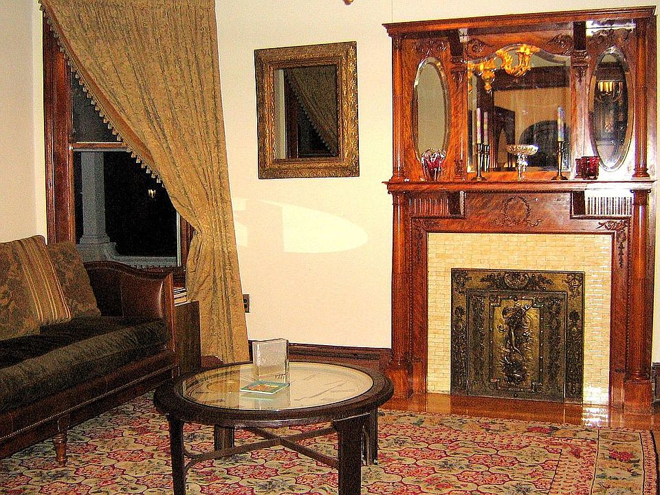 double parlor with 2 fireplaces and original woodwork