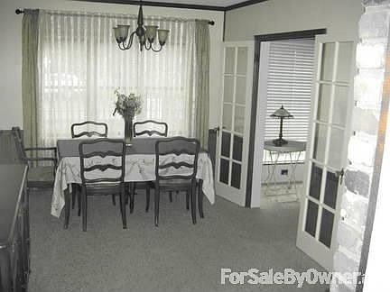 Formal Dining Room : Large formal dining. Seperated from Living Room by French Doors.