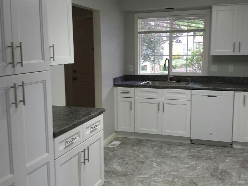 Remodeled Kitchen with Pantry Cabinet