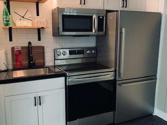 Brand new stainless full size appliances, galley kitchen