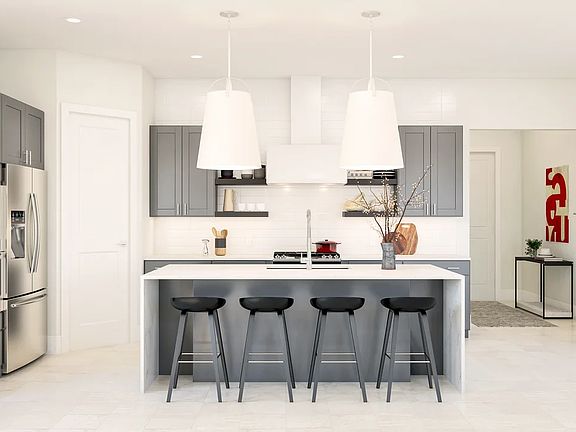 Kitchen with vast island floating shelves