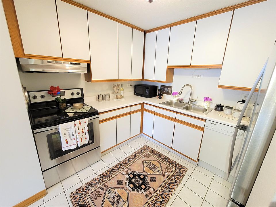 Charming Kitchen with dishwasher and Stainless Steel Appliances