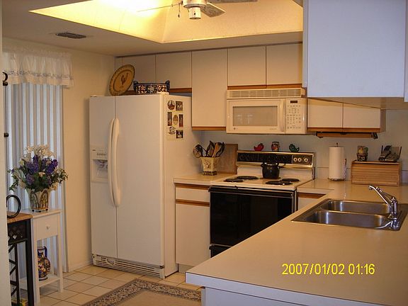 Kitchen w/sliders to front patio 