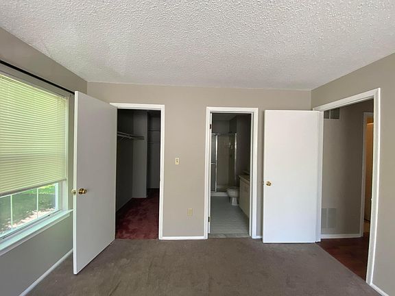 master bedroom, walk-in closet (has new carpet) and master bath view
