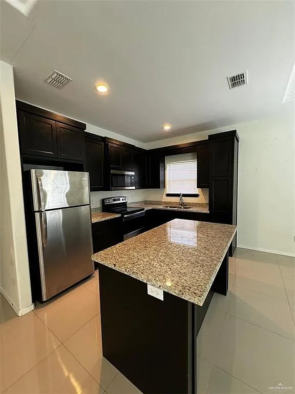 Building Photo - 3102 Sabercat Ave #1