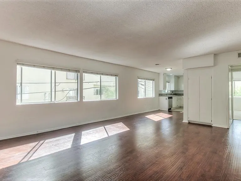An abundance of natural light, open kitchen concept, hardwood flooring and storage space. 

*Images are of model unit-actual listing may differ slightly*