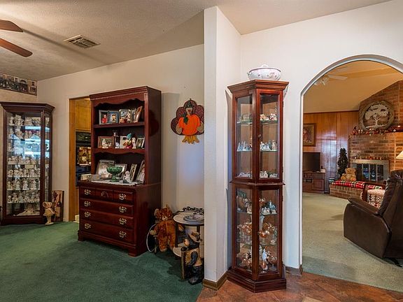 A stylish archway opens to the living room.