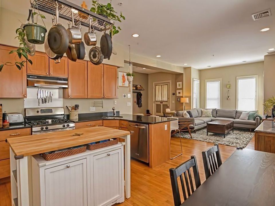 Kitchen view, decorated, looking into living room.