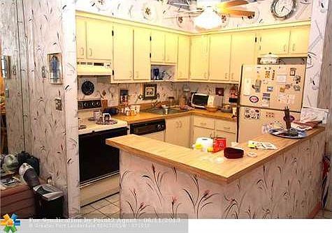 4th image of 9354 S Belfort Cir #209