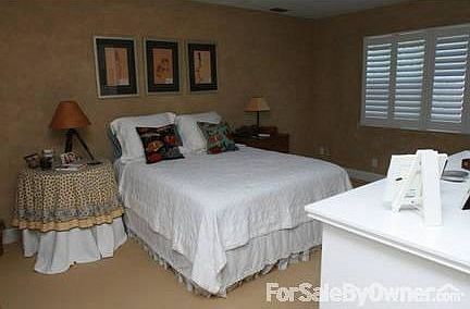 Master Bedroom : Plantation shutters, walk-in closet, dual sinks in MB with large tiled shower