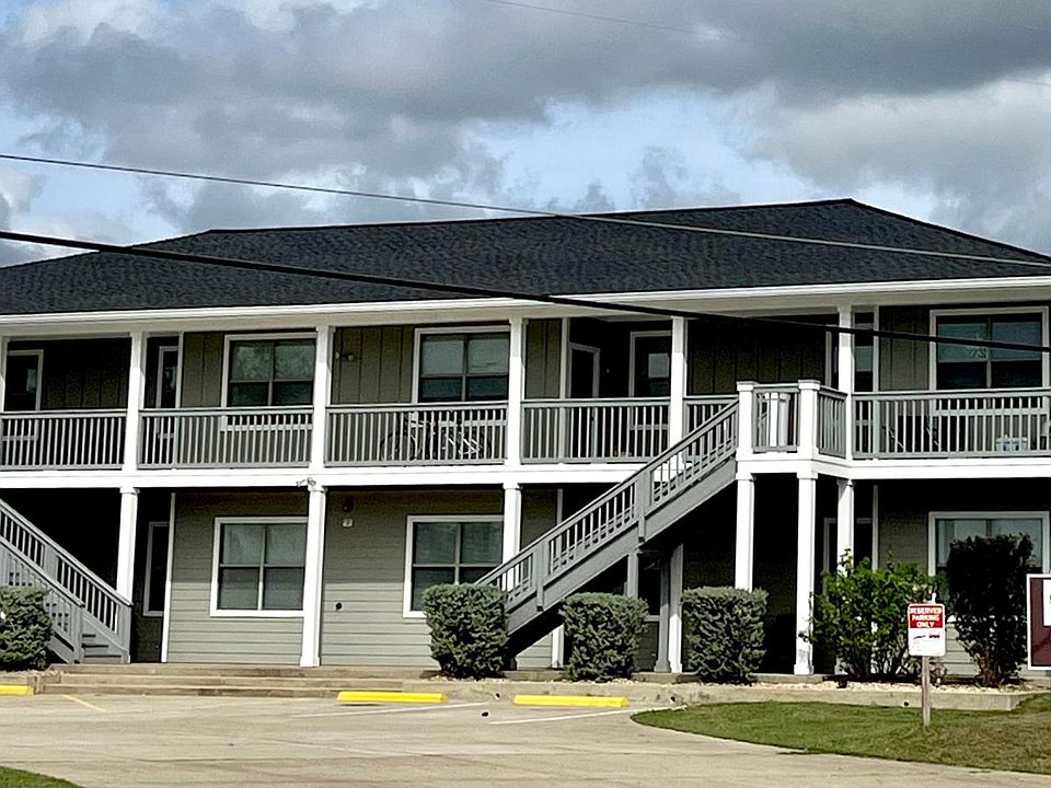 Stunning property setback off Hwy 21 in a park-like setting with plenty of parking