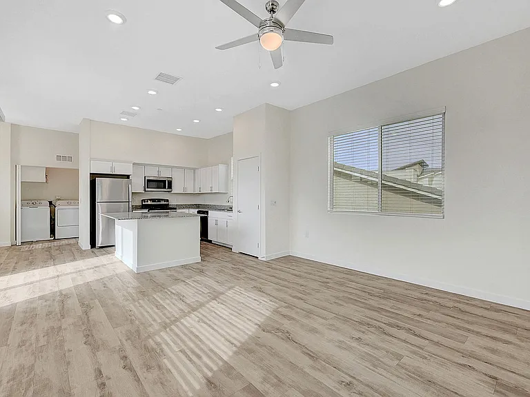 Immerse yourself in this sunlit, open-concept apartment, perfect for contemporary living.