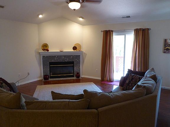Fireplace and Sliding Doors to Balcony in Great Room
