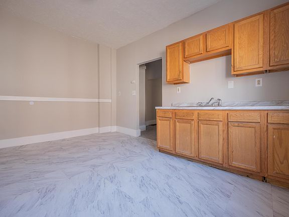 5th image of 3425 E 119th St #1-3