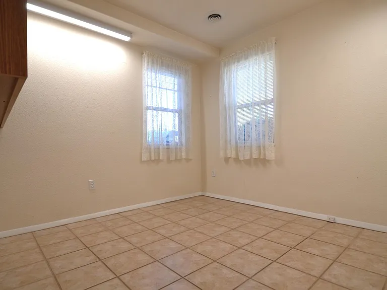 Office/4th BR has two windows & heated floor.