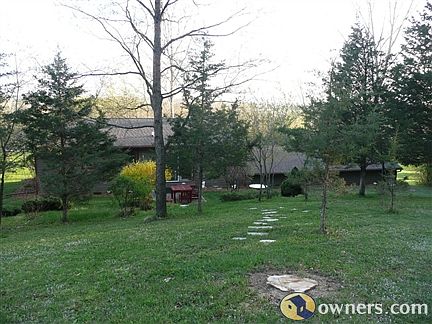 back sitting area with fire pit