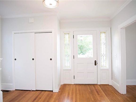 Large coat closet in foyer.