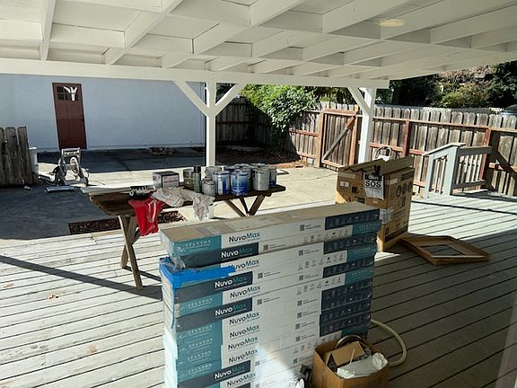 Backyard Deck. (Need to remove construction supplies)