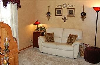 Formal Living or Dining Room with Vaulted Ceiling, Newer Carpet and Faux Pain