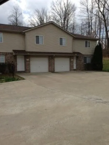 Ample parking in quiet wooded setting