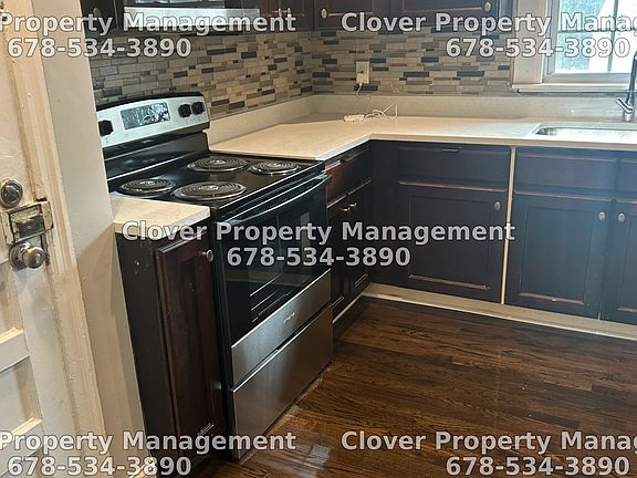 Granite countertops and brand new appliances (Oven, Range, Microwave, Refrigerator with Freezer)