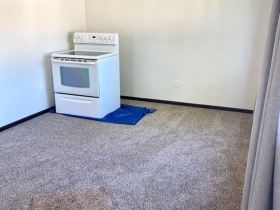 Living room - oven will be installed upon tenant move-in.